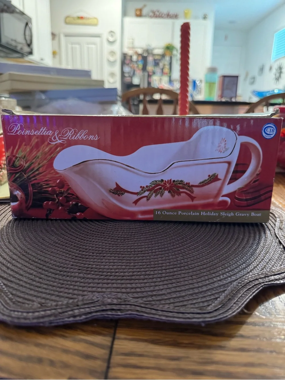 Classic White Ceramic Holiday Sleigh with Red & Green Ribbon Accents